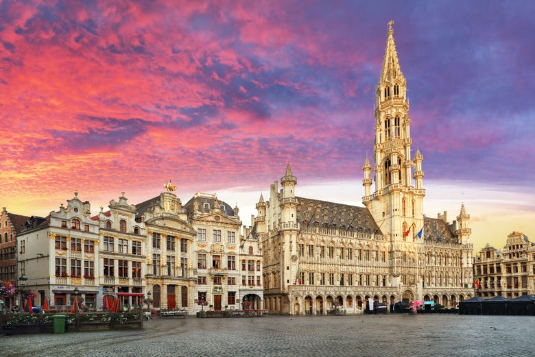 Purple, orange and red sky above Grand Place, Brussels, with no one in the square.