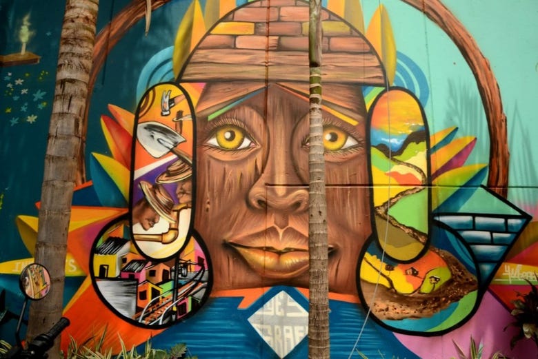 Grafite sobre os índios e trabalhadores da Comuna 13