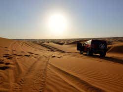 The desert sunset seen from a Hummer H2