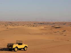 Exploring the desert in a historic Land Rover