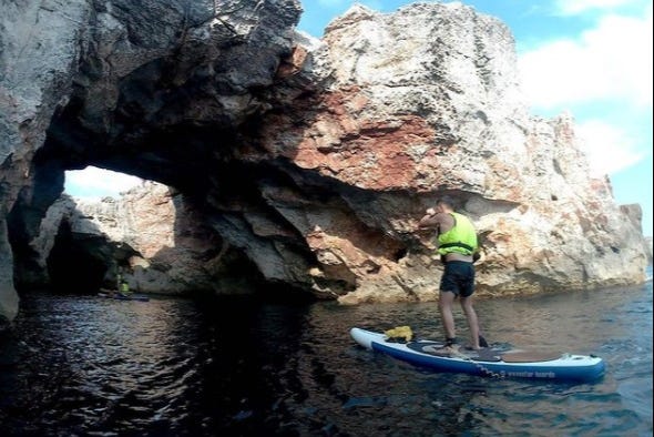 Paddle surfing in Menorca