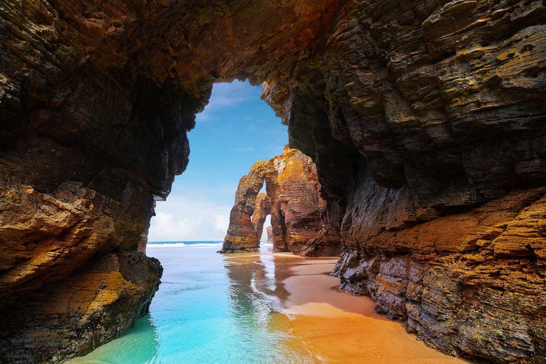 Natural arches of the beach of the Cathedrals