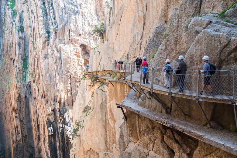 Walking along the dramatic cliff faces of El Chorro Gorge