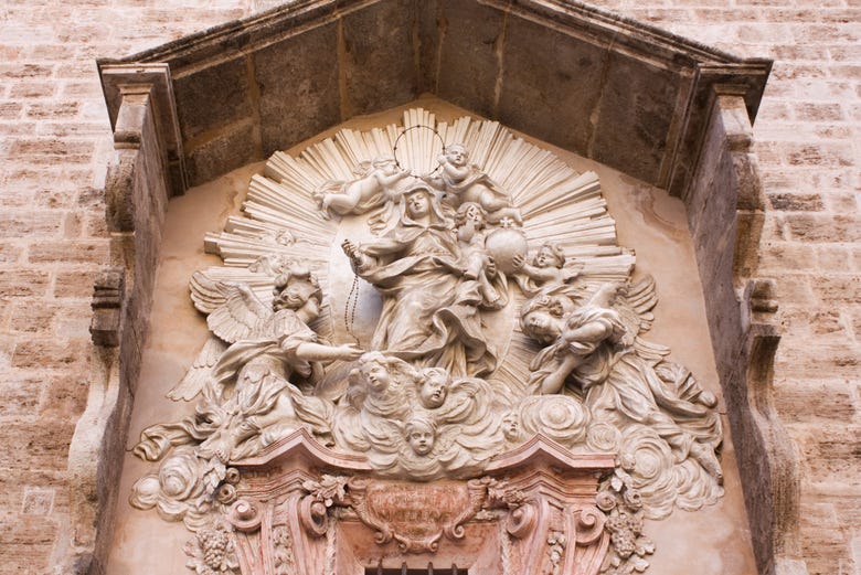 Baroque sculptures and engravings on the church's facade