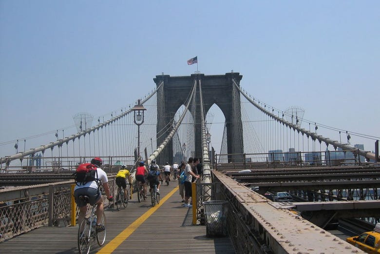 Crossing Brooklyn Bridge on bicycle 