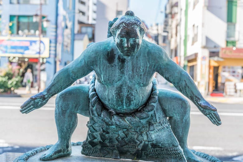 Statue of a sumo wrestler in Ryogoku