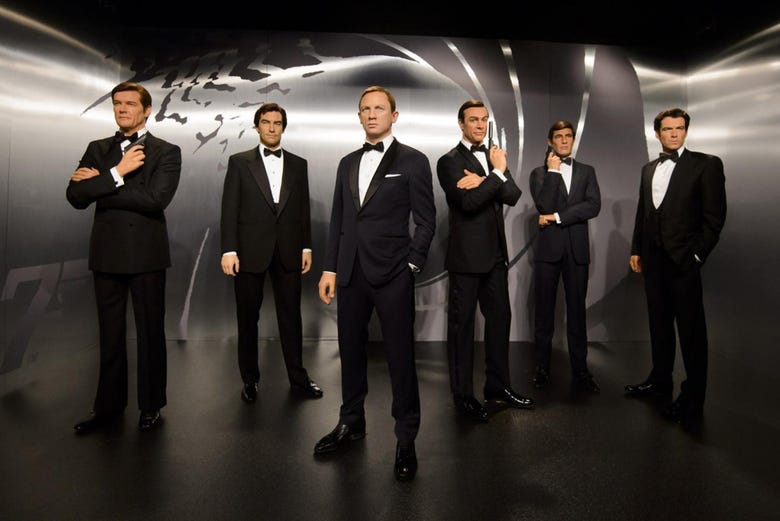 Different James Bond actors in the wax museum