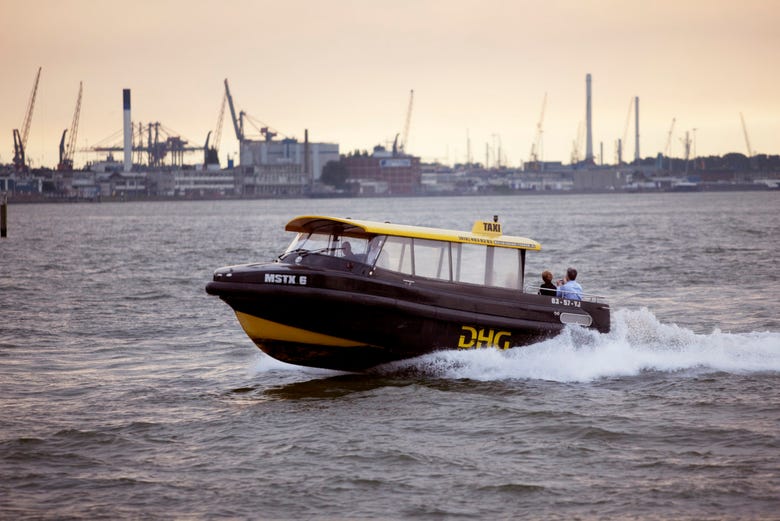 Watertaxi cruising around Rotterdam