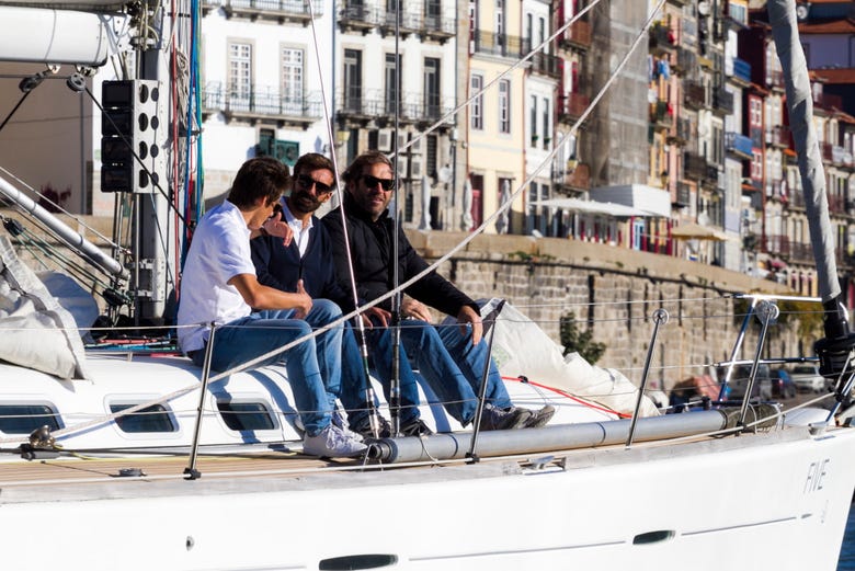 A group of friends enjoying the sailboat trip
