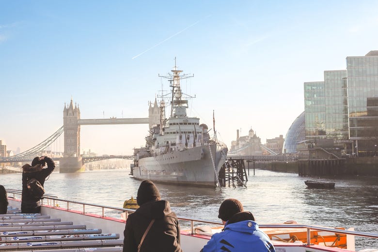 HMS Belfast crossing London Tower Bridge
